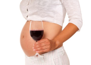 pregnant woman with alcohol